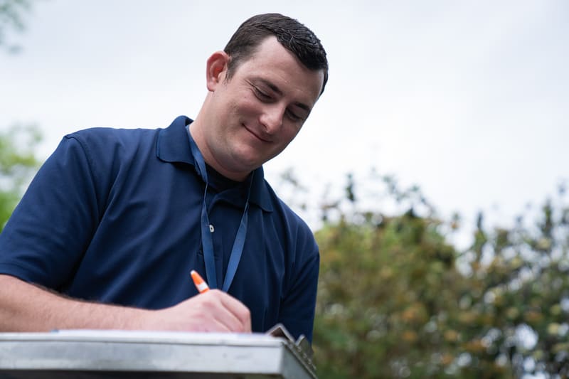 Crawl Space Brothers technician servicing a crawl space system