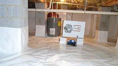 Dehumidifier installed in an encapsulated crawl space