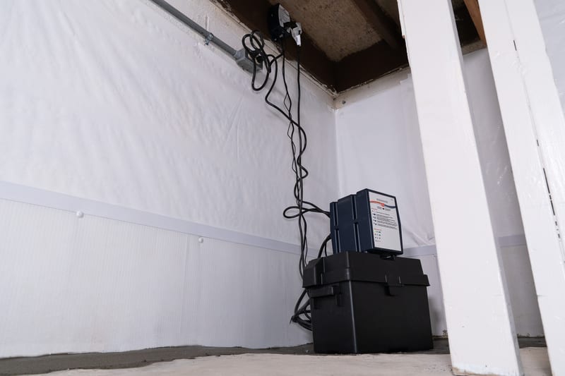 workers in flooded basement