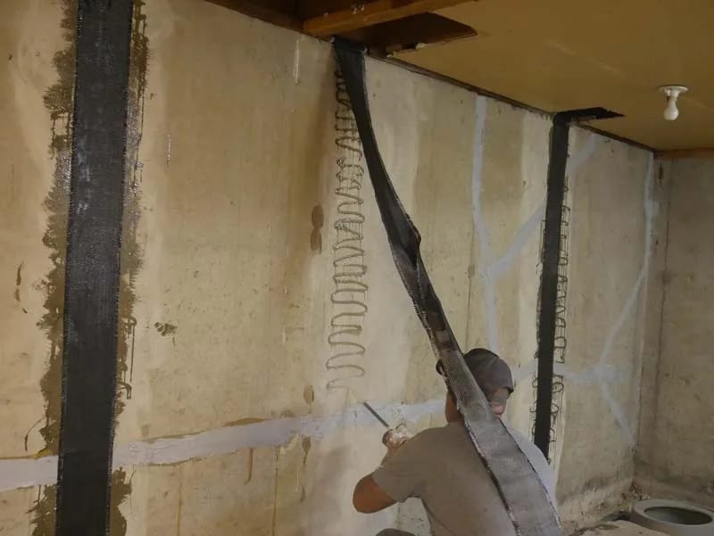 Carbon fiber reinforcement on a basement wall